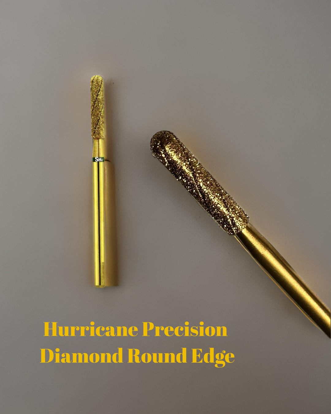 Picture of the Hurricane Precision Diamond Round Edge Bit: The Ultimate Tool for a Deep-Clean Manicure and the Perfect Sanding Band Replacement.